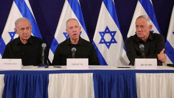 From left: Israeli Prime Minister Benjamin Netanyahu, with Defense Minister Yoav Gallant and Cabinet minister Benny Gantz at a news co<em></em>nference in October 2023