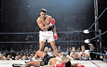 Muhammad Ali stands triumphant after beating So<em></em>nny Liston