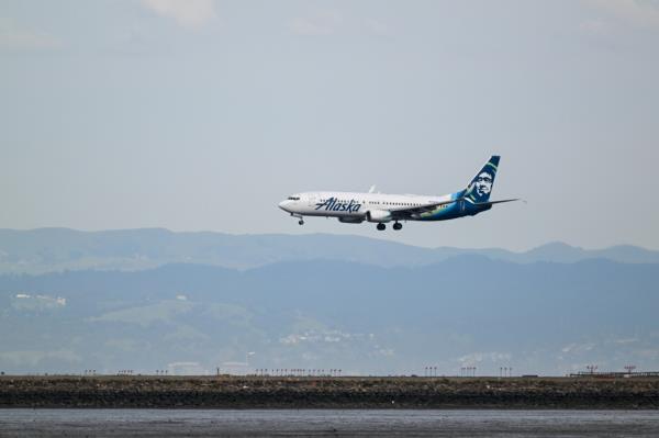 Alaska Airlines plane in flight