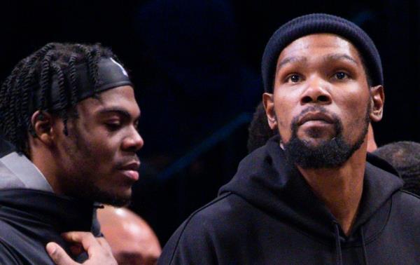 attendance for the Nets' win over the Lakers, did not travel with the team to Boston during their 139-96 loss to the Celtics.