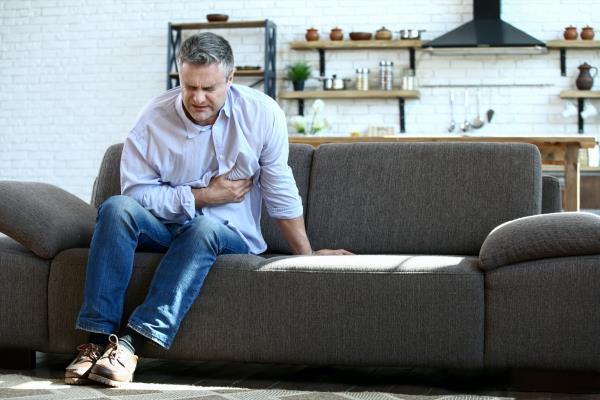 mature man havin<em></em>g heart attack at home