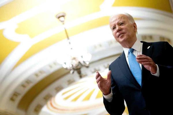 US President Joe Biden speaks to reporters after attending the Senate Democrat policy luncheon at the US Capitol in Washington, DC, on March 2, 2023.