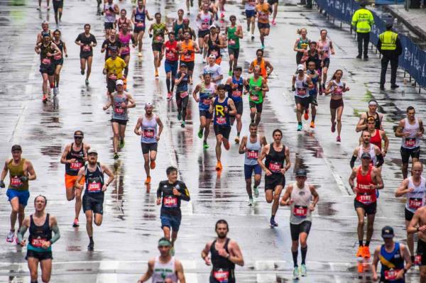 Thousands of runners make their way to the finish line during the 127th Boston Marathon in Boston.
