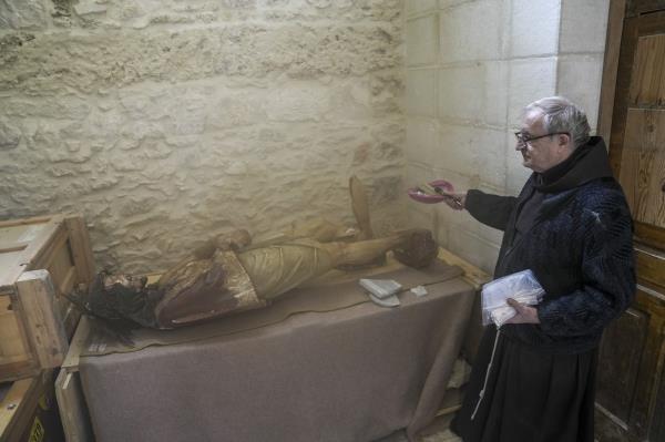 Jesus statue in Jerusalem's Old City laying on the floor inside the church