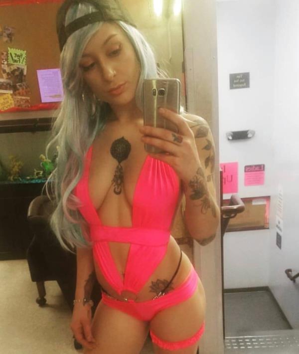 A dancer taking a selfie at Shotgun Willie's