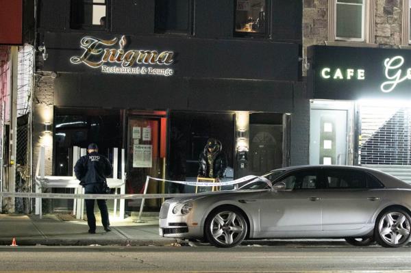The taped-off crime scene at Co<em></em>ney Island Avenue near Avenue T.