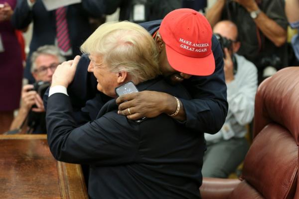 Trump hugs West during an October 2018 meeting in the Oval Office.