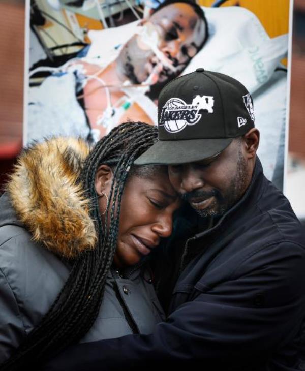 Kenyana Dixon is comforted during a rally for her brother Tyre Nichols at the Natio<em></em>nal Civil Rights Museum.