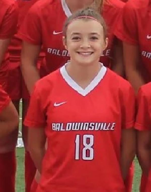 Ava Wood in her soccer uniform