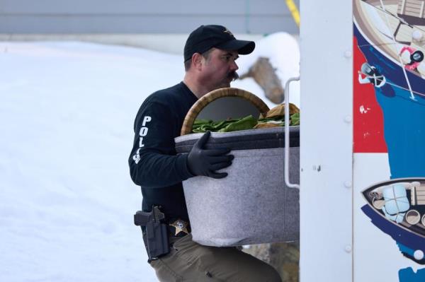 A box being removed with Madison Mogen's name on the side.