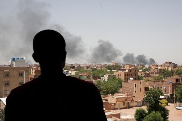 Smoke rising from buildings in Khartoum on April 22, 2023.
