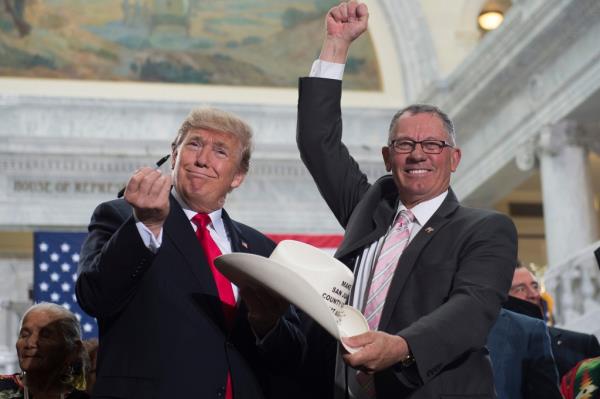 San Juan County Commissio<em></em>ner Bruce Adams poses with then-President Trump in 2017. 