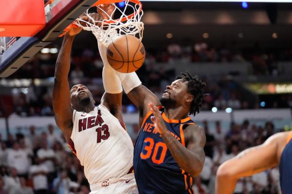 Bam Adebayo slams home a dunk over Julius Randle during the Knicks' Game 3 loss.