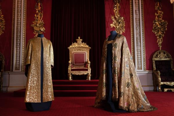 The Coro<em></em>nation Vestments, comprising of the Supertunica (left) and the Imperial Mantle (right).