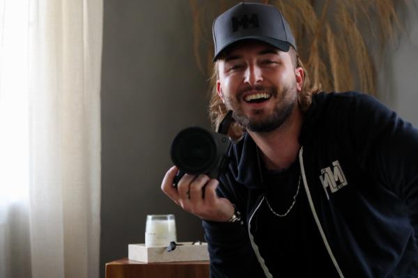 Messina with a camera.