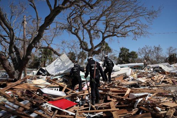 People look for hurricane victims