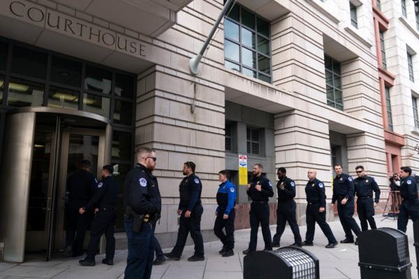 Capitol police arrive for the sentencing of Julian Khater and George Tanios.