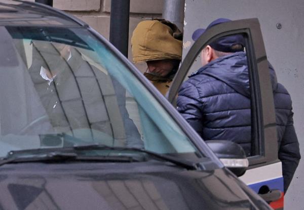 Gershkovich leaves a court building in Moscow, Russia March 30, 2023. 