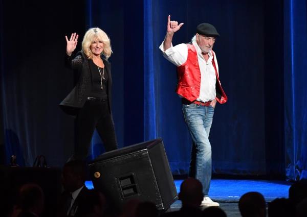 McVie and ex-husband John accept the MusiCares Person of the Year award ho<em></em>noring Fleetwood Mac at Radio City Music Hall in 2018.