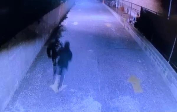 After being shot multiple times, the alleged robber tries to run away but collapses a few feet away. 