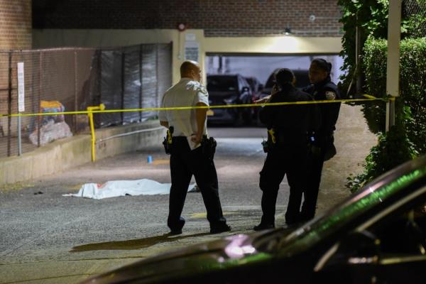 Police found a gun near the robber's body, along with a pen in his hand. 