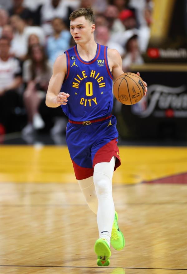 Christian Braun #0 of the Denver Nuggets dribbles the ball during the first half against the Miami Heat in Game 3 of the NBA Finals.