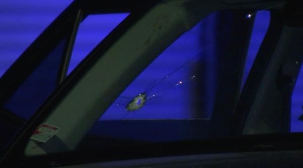 A bullet hole is seen in the Hyundai SUV wher<em></em>e Claudia was sitting when she was shot.