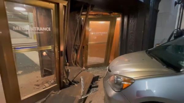 The vehicle did not breach the doorway and nobody was injured.