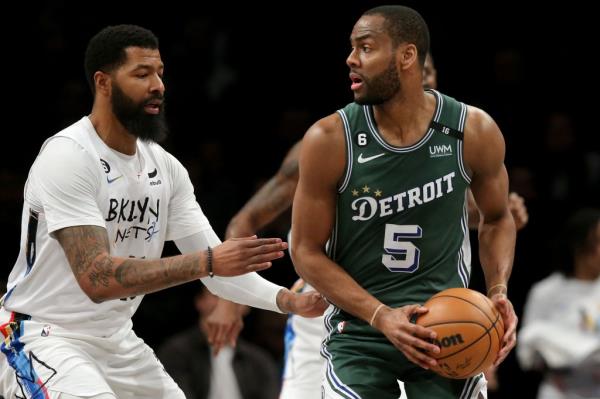 Former Knick Alec Burks, making a move on Markieff Morris, scored 20 points for the Pistons.