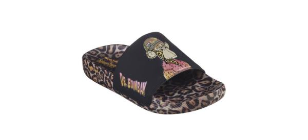 cheetah print slide sandals with a black upper portion that has a cartoon image of Dr. Bombay on the top and the words 