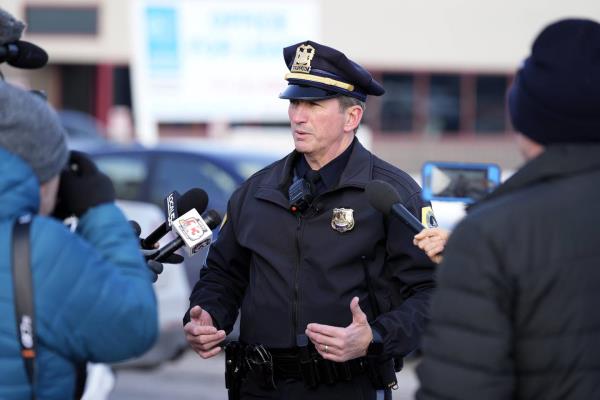 Des Moines Police spokesman Sgt. Paul Parizek speaks outside the Starts Right Here building, Monday, Jan. 23, 2023, in Des Moines, Iowa. 