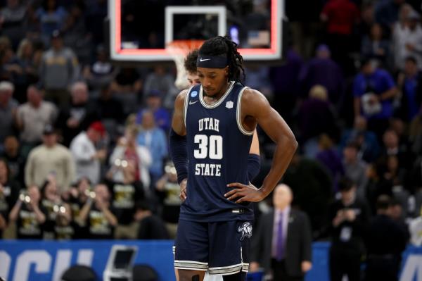 Dan Akin of the Utah State Aggies reacts after the teams loss to Missouri earlier this week.