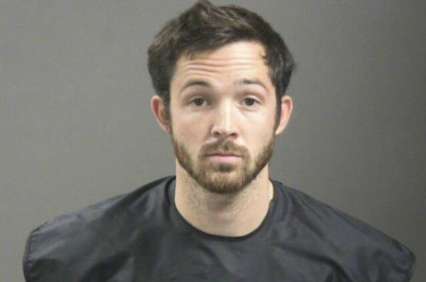 This booking photo provided by the Washington County, Ark., Sheriff's Office shows John Tyson, Tyson Foods chief financial officer. Tyson was arrested for criminal trespassing and public intoxication in Fayetteville, Ark., on Nov. 6. 