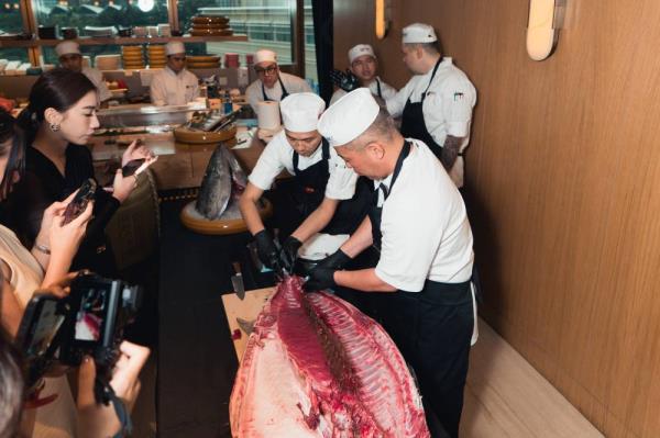Nobu Corporate Sushi Chef, Chef Toshiyuki Shiramizu cutting off the Bluefin Tuna assisted by Nobu KL Chef 