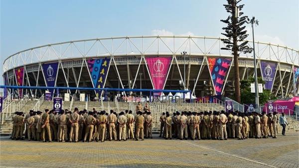 Police perso<em></em>nnel gather outside the stadium for a briefing ahead of the 2023 ICC Men's Cricket World Cup one-day internatio<em></em>nal (ODI) match between India and Pakistan at the Narendra Modi Stadium in Ahmedabad October 12, 2023