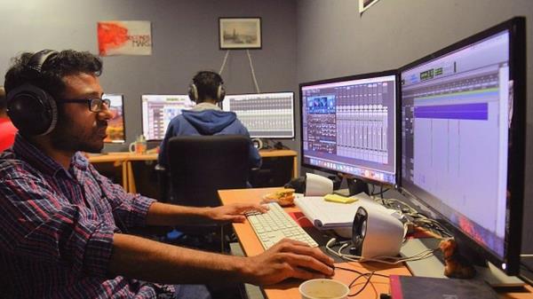 An employee of Byju's works on co<em></em>ntent development for the app at their office in Bangalore