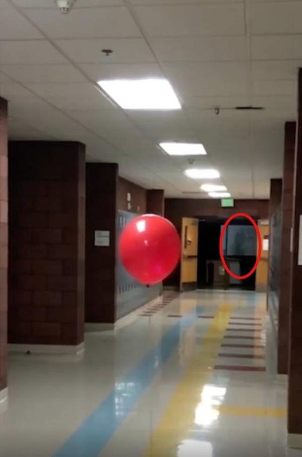 A shadowy figure moves across the back of the room. Credits: Reddit/TheMrMorbid