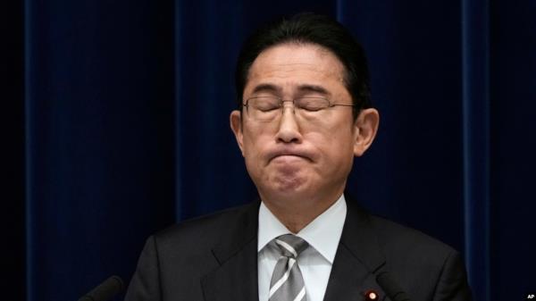 Japanese Prime Minister Fumio Kishida reacts as he speaks during a news co<em></em>nference in Tokyo, Dec. 13, 2023.