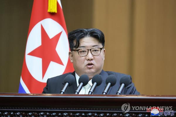 This photo, carried by North Korea's official Korean Central News Agency on Jan. 16, 2024, shows the North's leader Kim Jong-un delivering a speech at the 10th session of the 14th Supreme People's Assembly held in Pyo<em></em>ngyang the previous day. (For Use o<em></em>nly in the Republic of Korea. No Redistribution) (Yonhap)