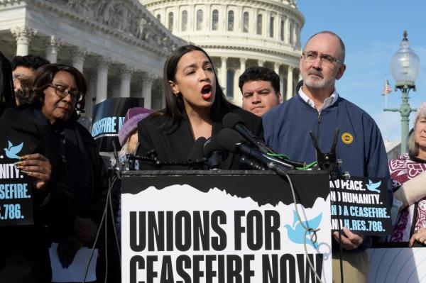 Co<em></em>ngresswoman Alexandria Ocasio-Cortez is pictured speaking a<em></em>bout the Israel-Gaza war and calling for a ceasefire during a press co<em></em>nference at the House Triangle/Capitol Hill in on Dec. 14.