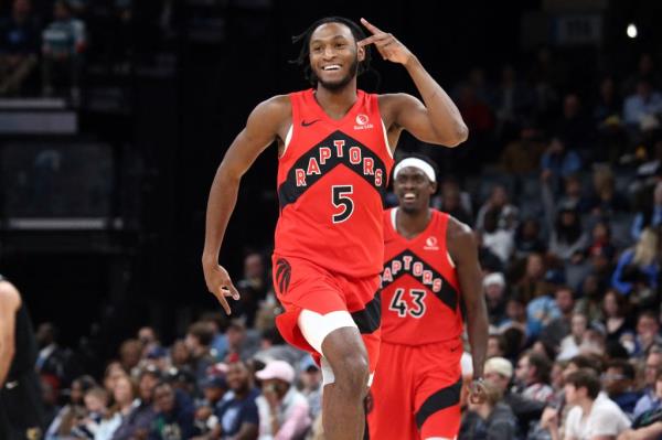 Immanuel Quickley, who scored a team-high 26 points, celebrates during the Raptors' 116-111 win over the Grizzlies.