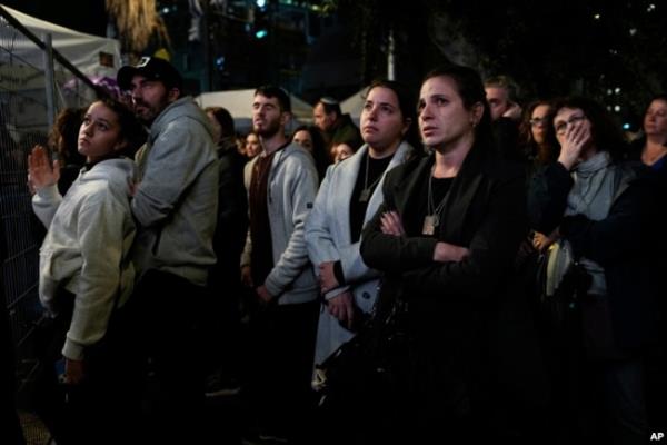 People attend a 24-hour rally calling for the release of the hostages kidnapped by Hamas militants into the Gaza Strip, in Tel Aviv, Israel, Jan. 14, 2024. Sunday marked 100 days of war between Israel and Hamas.